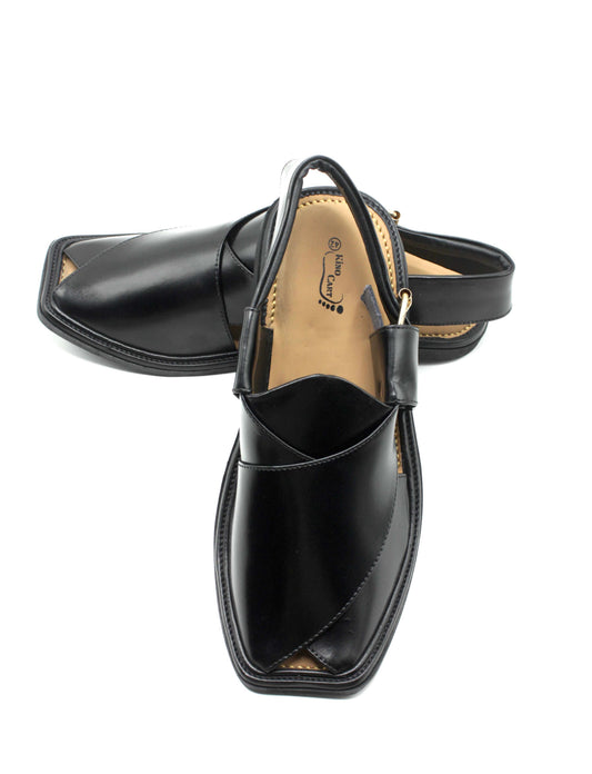 Black leather Peshawari sandal with a unique design on a white background