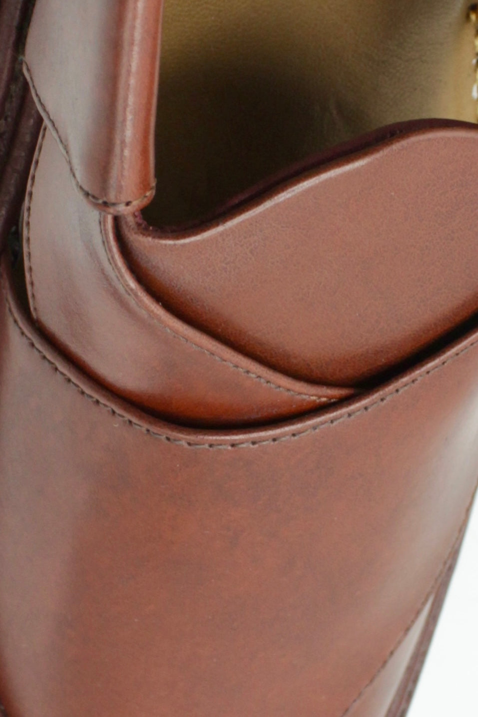 Close-up of a brown leather Peshawari shoes with visible stitching