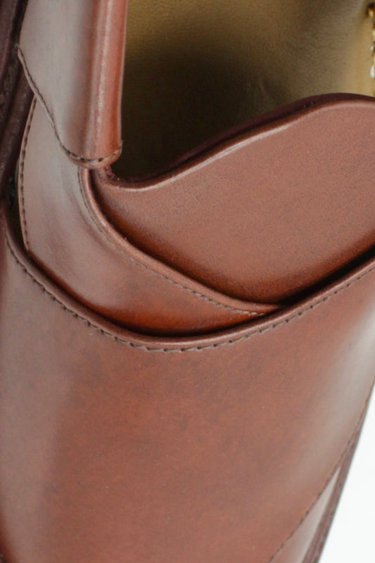 Close-up of a brown leather Peshawari shoes with visible stitching